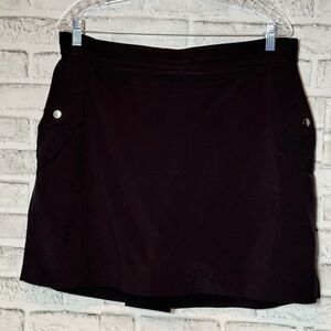 Athleta Black Mini Skort size‎ 16 multiple pockets slit in back